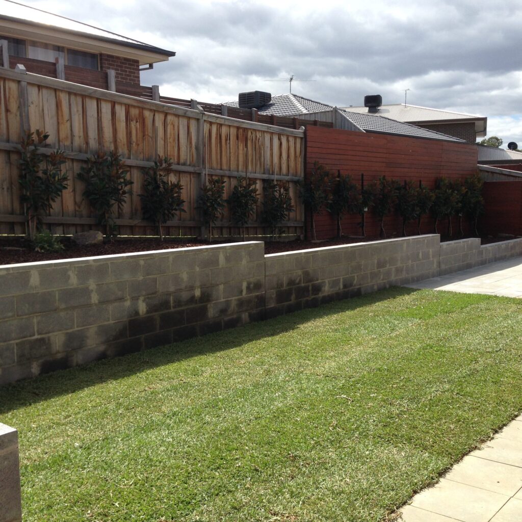 Block retaining wall in Croydon by InEx Lifestyle Design landscapers