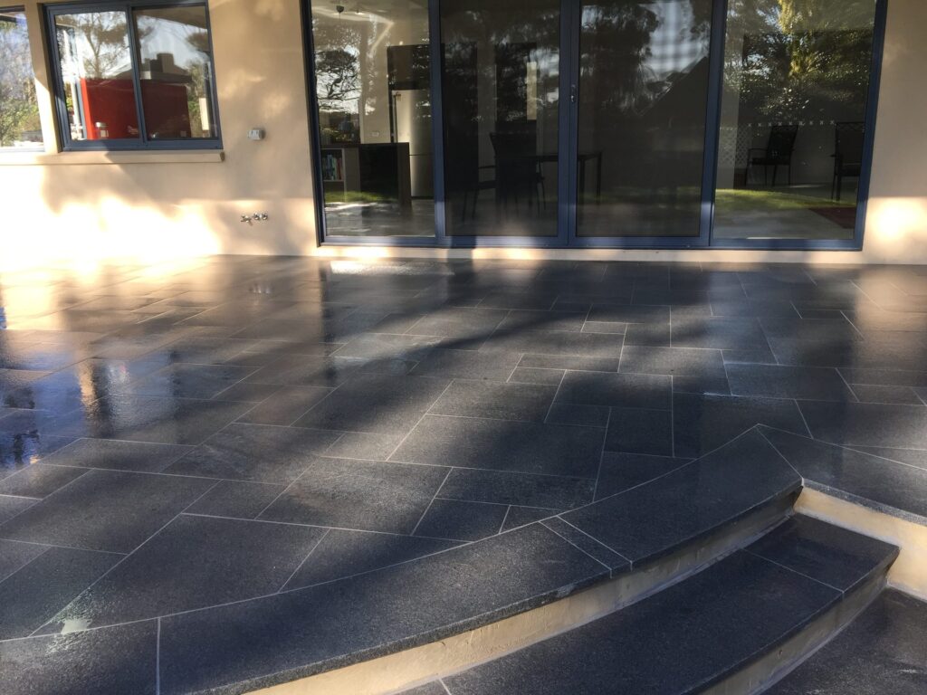 Curved tiled alfresco in Mornington by InEx Lifestyle Design landscapers