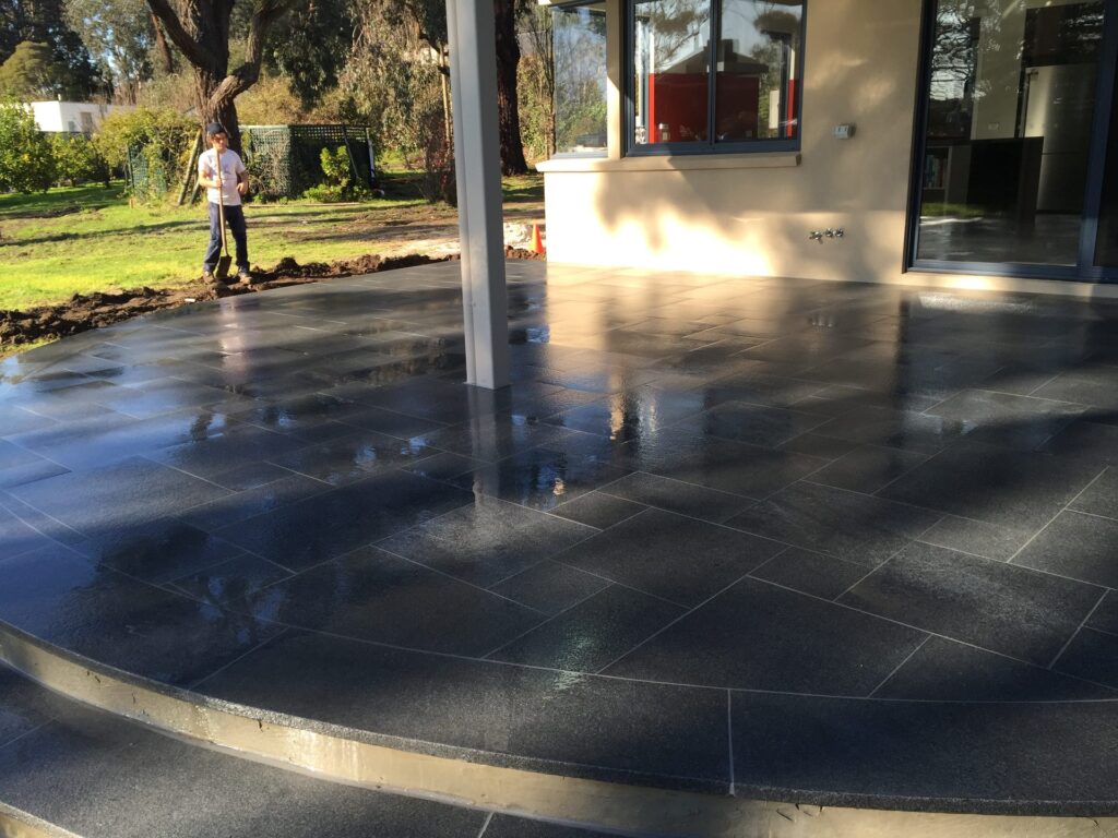 Curved tiled alfresco in Mornington by InEx Lifestyle Design landscapers