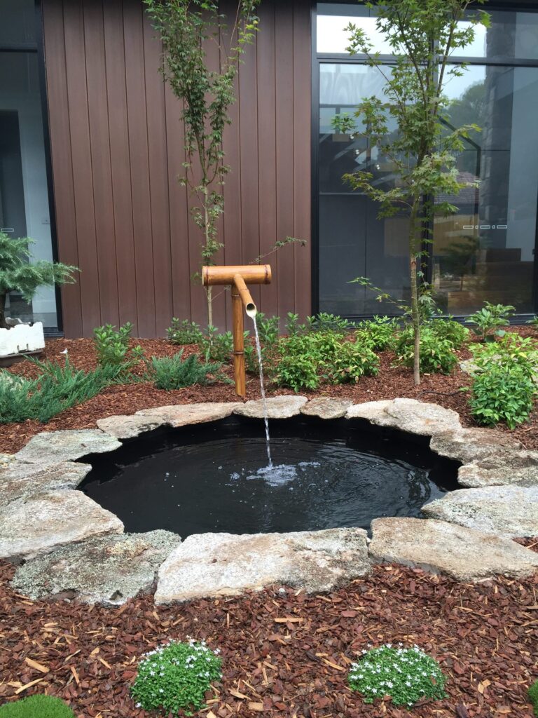Japanese garden water feature in Park Orchards by InEx Lifestyle Design landscapers