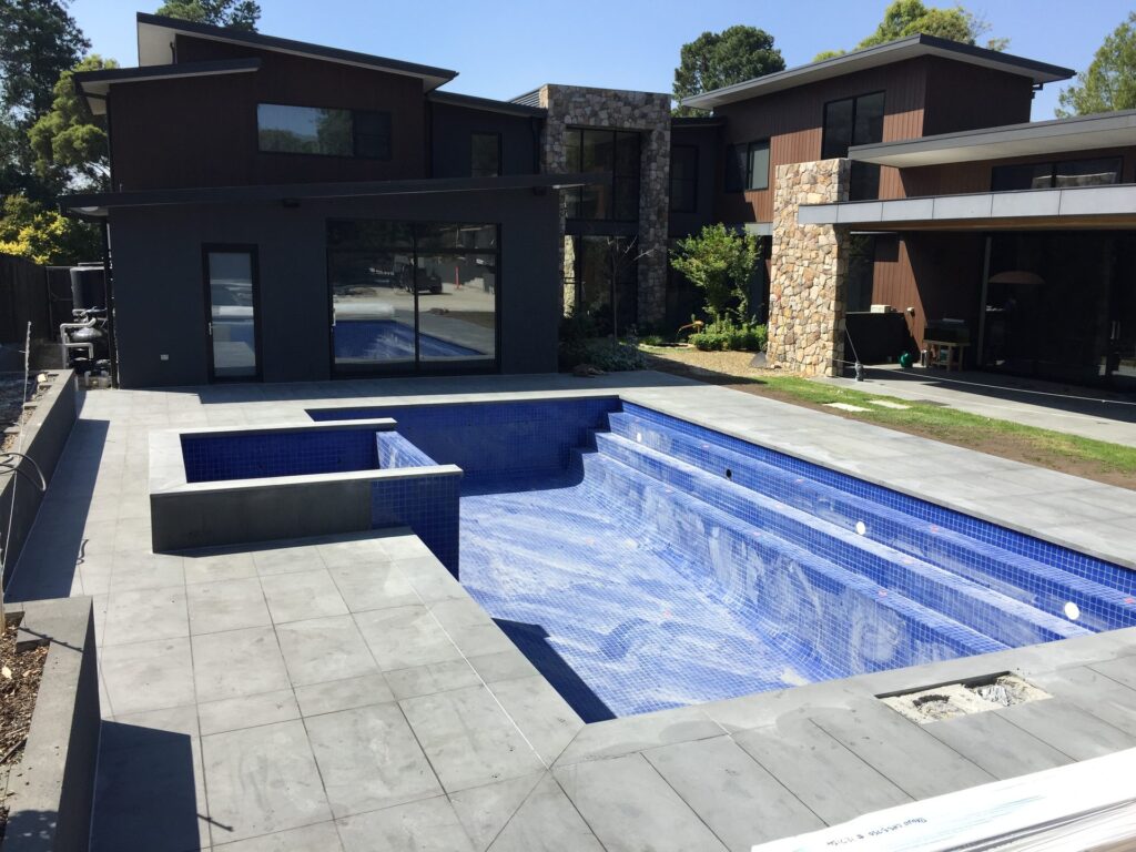 Porcelain pool coping in Park Orchards by InEx Lifestyle Design landscapers