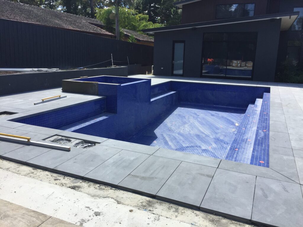 Porcelain pool coping in Park Orchards by InEx Lifestyle Design landscapers