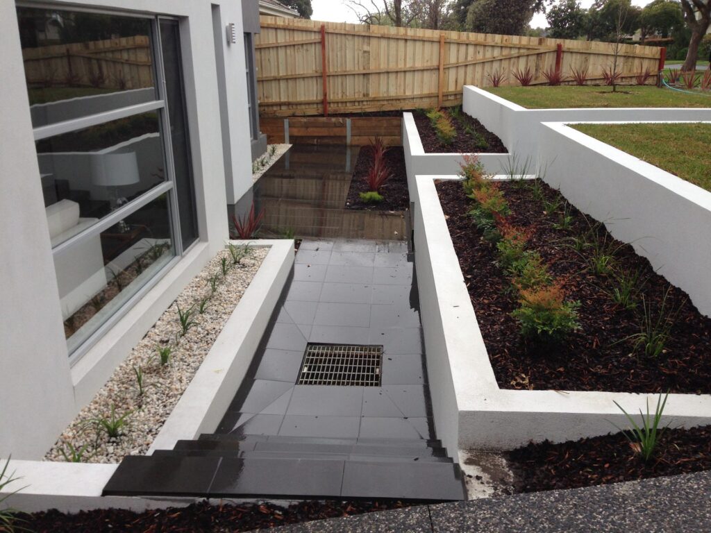 Rendered retaining walls in Glen Iris by InEx Lifestyle Design landscapers