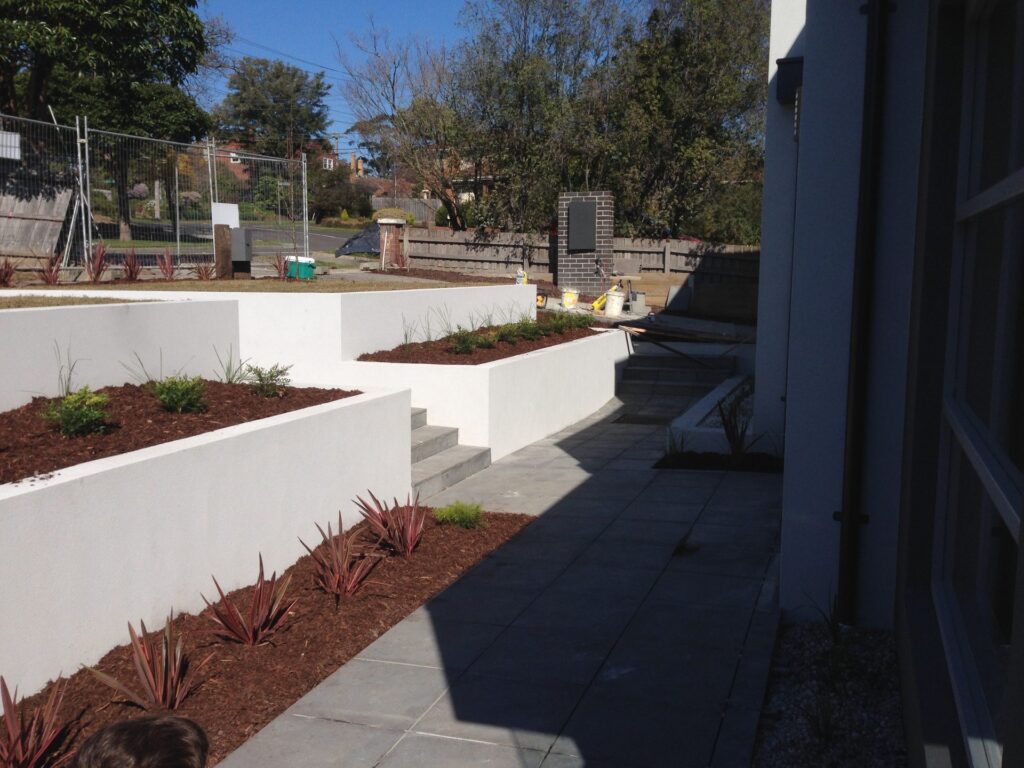 Rendered retaining walls in Glen Iris by InEx Lifestyle Design landscapers