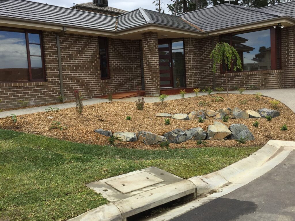 Rock garden front yard in Donvale by InEx Lifestyle Design landscapers