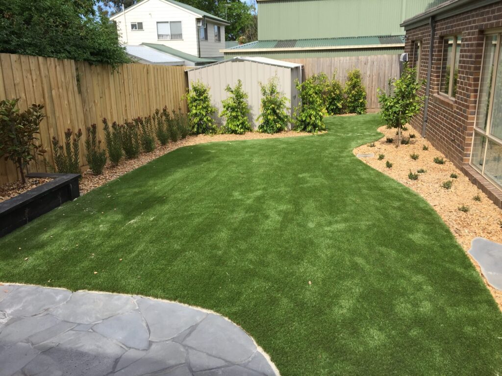 Synthetic grass backyard in Mitcham by InEx Lifestyle Design landscapers