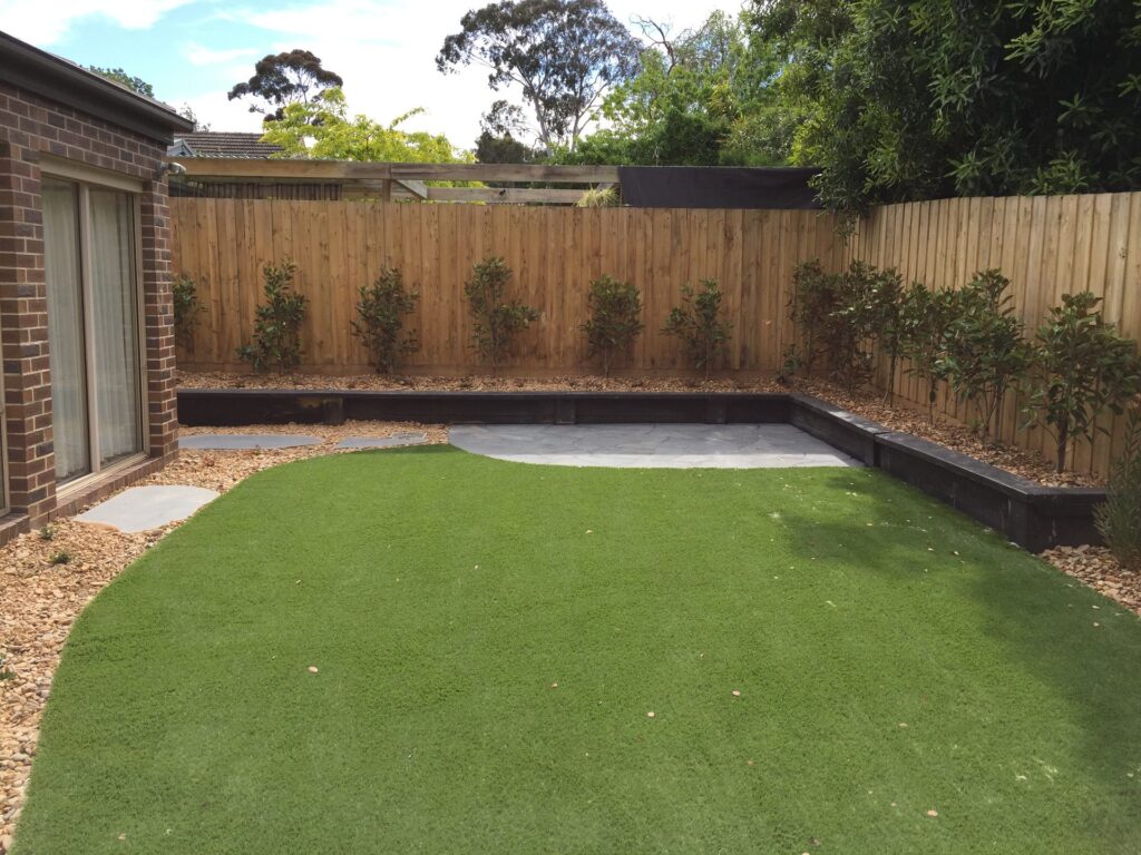 Synthetic grass backyard in Mitcham by InEx Lifestyle Design landscapers